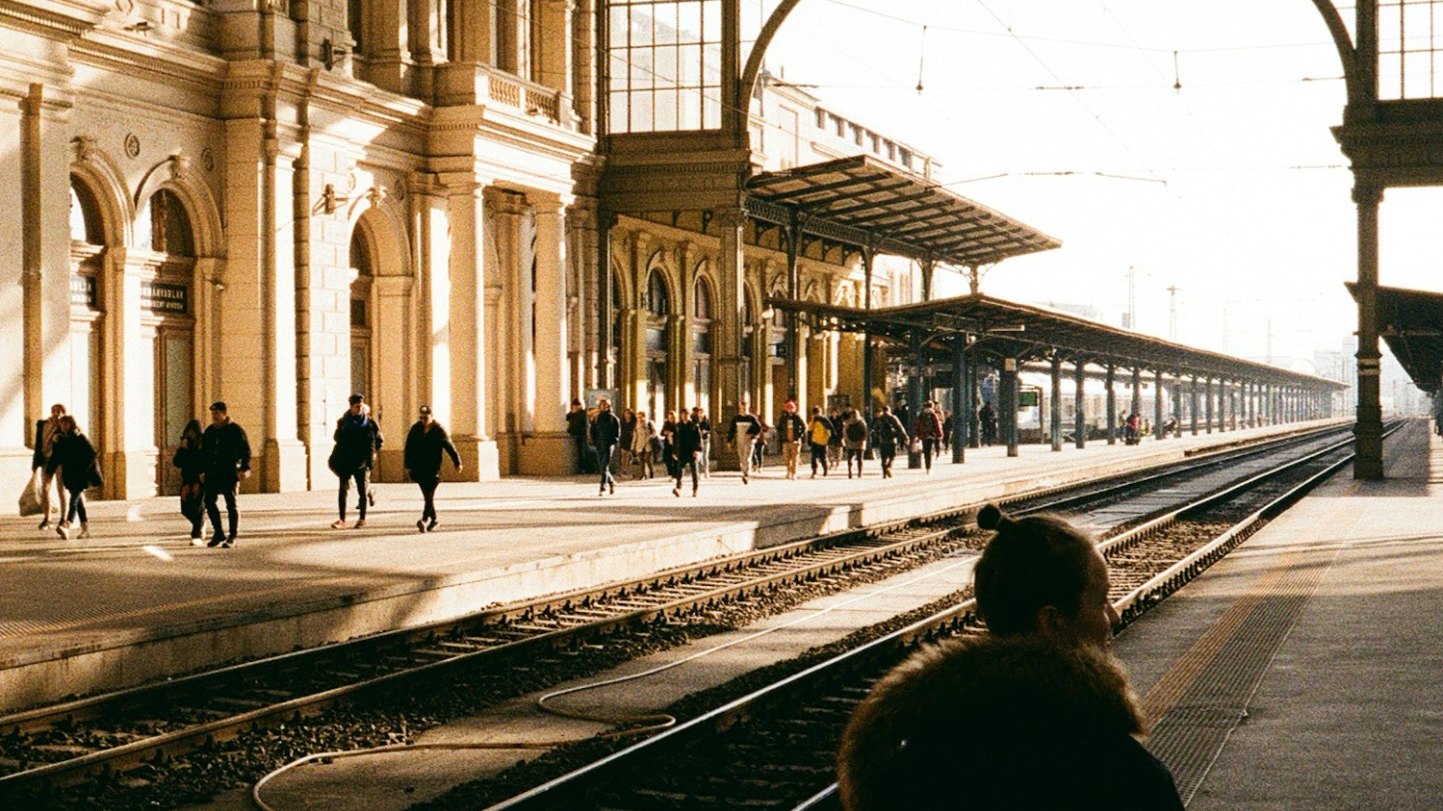 European railway station platform in warm afternoon light